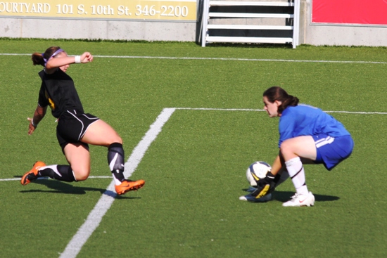 Katie Jo Swanson makes a stop in goal
