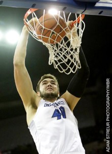 Zach Hanson throws down a dunk for two of his four first-half points against Arizona State. (Photo by Adam Streur / WBR)